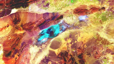 Colorful landsat imagery of a desert area analyzed with geospatial technology