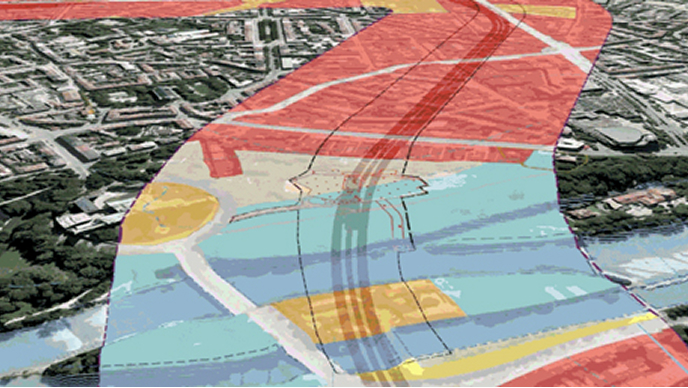 Aerial photo of a riverside city, overlaid with a wide colorful ribbon denoting different regions