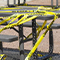 Yellow hazard tape covering a picnic table in a public park