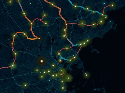 Dark gray map of energy utility network with illuminated lines and points