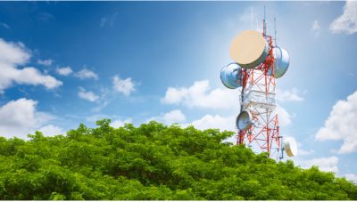 Man standing outside and talking on cell phone