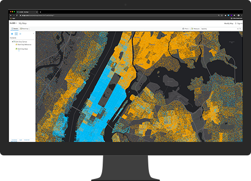 Na monitorze komputera wyświetlana jest mapa z widokiem miasta z góry.