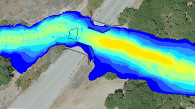 A blue and yellow gradient of color crosses over a roadway to indicate critical environmental information. 