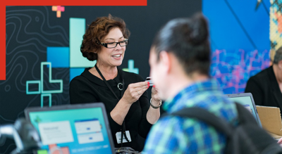 A professional setting featuring a registration desk at an event.