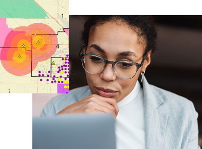Person holding a lap top in an office setting
